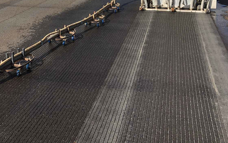 runway grooves Water drop balanced on a blade of grass